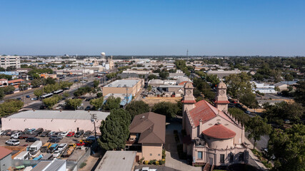 Wall Mural - Afternoon aerial view of the urban downtown core of Modesto, California, USA.