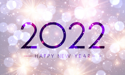 Fogged glass 2022 sign on fireworks bokeh background.