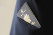Saint Kitts and Nevis passport in the pocket of a businessman's suit