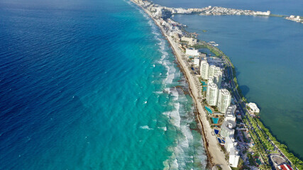 Wall Mural - Aerial shot of the hotels and resorts surrounded by seawater in Cancun, Mexico