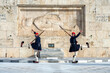 Evzones (soldiers of the greek Presidential Guard) in front of the monument of the Uknown Soldier's tomb in front of the greek parliament.