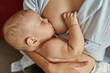 Breastfeeding baby in perfect and comfortable position
