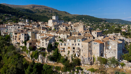 Wall Mural - Aerial view of the medieval village of Tourrettes sur Loup in the mountains above Nice on the French Riviera, France - Old stone houses nestled on a belvedere in Provence