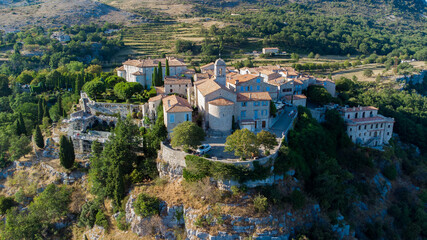 Sticker - Aerial view of the medieval village of Gourdon in Provence, France - Stone church built on the edge of a cliff in the mountains of the Gorges du Loup on the French Riviera