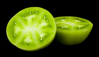 Sticker - Green tomatoes isolated on black background.