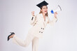 © tonefotografia - Portrait of young woman graduated over white background.