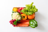 Fototapeta Kuchnia - Basket with fresh mixed vegetables on white background
