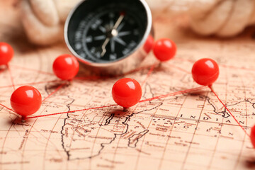 Sticker - World map with pins and compass, closeup