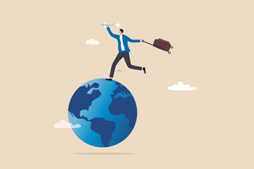 Travel passion when the world open after COVID-19, global tourism growth and tourist return their travel plan concept, happy man holding airplane and vacation baggage running on world map globe.