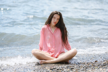 Wall Mural - Beautiful adult woman enjoy sea on sunny day.