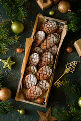 Wall Mural - Christmas gingerbread cone cookies with Christmas decorations. New Year and Christmas celebration concept. Soft focus. Top view