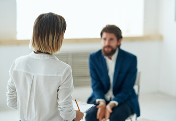 Wall Mural - a man at a psychologist's appointment therapy stress treatment communication