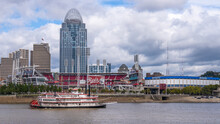 Tall Stack Paddlewheel Riverboat On The Ohio River With Cincinnati Ohio As The Background