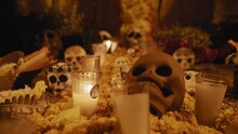 Altar Of The Dead Featuring Sugar Skulls, Candles, Cempasuchil Flowers, Incense Smoke, Corn And Food During The Celebration Of The Day Of The Dead In Mexico