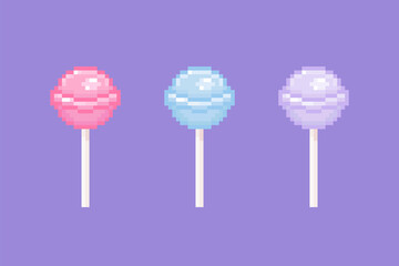 Wall Mural - Pixel art lollipop illustration set. Vintage classic round lollipops in retro 8 bit gaming style. Pixel isolated pink blue purple round lollipop icon. Vector.