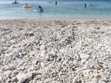 Fototapeta Londyn - Capobianco beach in Elba Island, Italy. White pebbles and cristal clear turquoise water