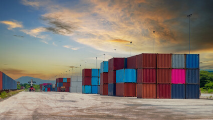 Dock logistics import export and transport industry of Container Cargo logistic freight shipment on harbor with twilight sky background.