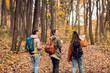 © Zoran Zeremski - Three female friends enjoying hiking in forest.