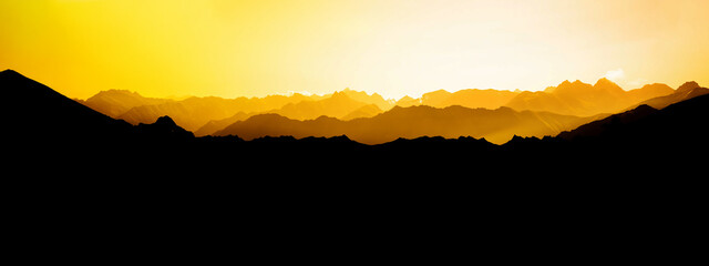 Wall Mural - Landscape background banner panorama illustration - Amazing view with black silhouette of mountains, hills and forest and yellow sky