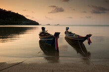 Thailand, Ko Samui Island, Traditional Boats Moored On Beach At Sunset