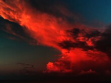 Fiery Red Clouds On The Night Sunset Sky 