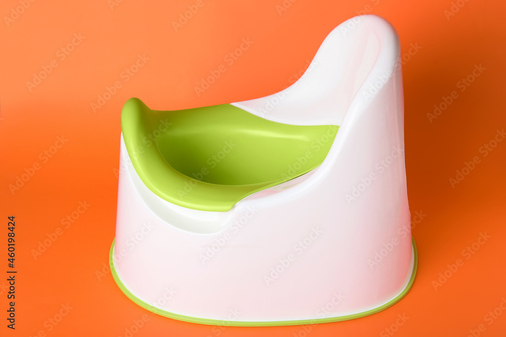 Potty on color background. Toilet training concept