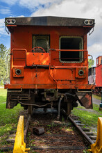 Rear Of Red Caboose Of Old Steam Locomotive