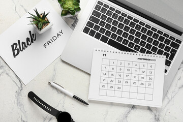 Sticker - Calendar page of November 2022 and laptop on white background. Black Friday