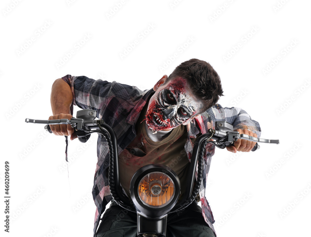 Man dressed for Halloween as zombie with motorcycle on white background