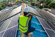 Maintenance solar power, engineer working, operation and maintenance in solar power plant on rooftop. clean energy