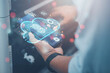 © Treecha - Business man builds a virtual interface using smartphones to exchange data storage for industrial networking, cloud technology concept.