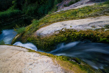 Small River On The Way To Waterfall Between White Rocks And Moss, Sant Miquel Del Fai Catalonia, Spain