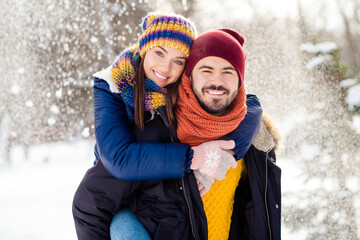 Canvas Print - Portrait of positive guy hold on back charming lady enjoy spending weekend on woods toothy smile look camera outdoors