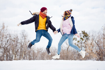 Poster - Full body portrait of pretty excited lady handsome carefree guy hands hold look each other open mouth smile outdoors