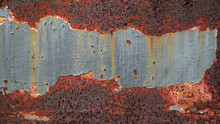Deterioration Of The Old Iron Grey Painted Peeling, Rusted On Surface Of Steel, Decay And Grunge Texture Background