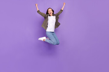 Poster - Full length body size photo woman jumping high overjoyed gesturing like winner isolated pastel purple color background