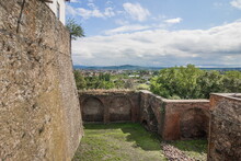 View From The Wall Of The Old Castle To The City.High Castle Wall. Internal Part Of An Ancient Castle. Inner Bastion Of Mukachevo Castle. Castle Constructed In 11 Century