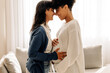 © (JLco) Julia Amaral - Pregnant lesbian couple at home