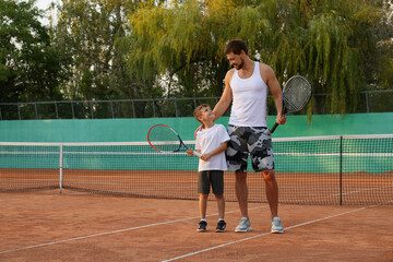 Sticker - Father with his son on tennis court