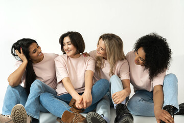 Wall Mural - multicultural diversity and friendship. group of different ethnicity women.