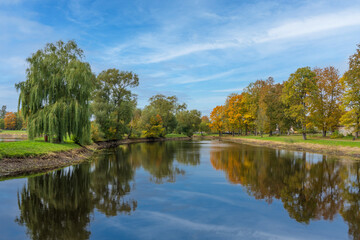 Golden autumn in City Park. Blue sky.