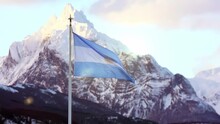 Flag Of Argentina And The Distinctive, Sharp Triangle-shaped Mountain Called Monte Olivia (Mount Olivia), In Ushuaia, Tierra Del Fuego Province, Argentina. 4K.
