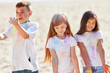 © Rychko Yevhen - kids having fun by playing with colored powder