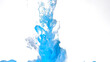 Blue and white watercolor ink in water on a white background. Beautiful abstract background. Blue and white paints are mixed in water.