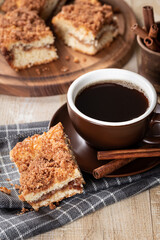 Wall Mural - Cinnamon crumb cake and cup of coffee