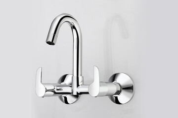 Modern stainless steel water tap. Isolated on white  Grey background| Plumbing for bathroom shower