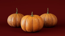 Contemporary Fall Image With A Collection Of Pumpkins On Dark Red Background.
