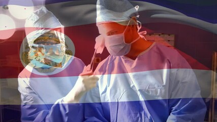 Sticker - Animation of flag of costa rica waving over surgeons in operating theatre