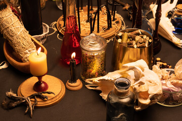 Wall Mural - Witchcraft still life with black burning candles selective focus. Esoteric gothic and occult witch table for Halloween. Various magic objects and ritual arrangement. Gothic Halloween.