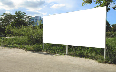 Wall Mural - Mockup Large white blank billboard or white promotion poster displayed on the outdoor against. Promotion information for marketing announcements and details.